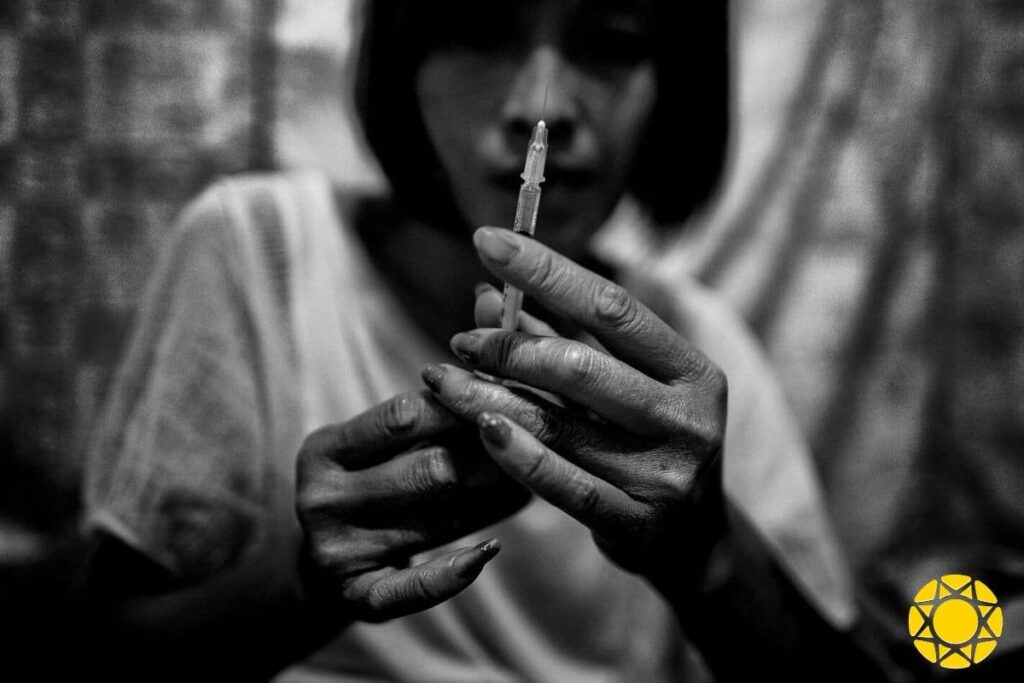 Woman suffering from heroin addiction.