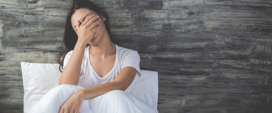 young-woman-is-depressed-white-bed_1150-19255